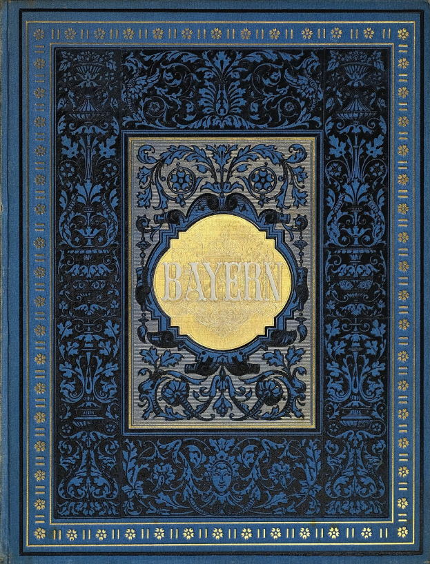 Blau-goldenes Buch mit dem Wort "Bayern" auf dem Cover, das mit detailreichen Verzierungen geschmückt ist.