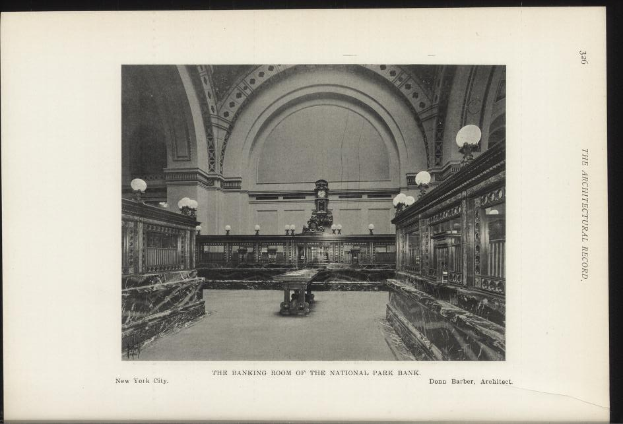Schwarzes und weißes Foto des Bankettsaals der National Park Bank in New York City, das Tische, Lampen, eine Uhr an der Wand und Text am unteren Rand zeigt.
