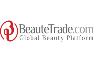 Das Logo von Beaute Trade, einer globalen Schönheitsplattform, mit den Wörtern "BeauteTrade" in fetter, schwarzer Schrift, zentriert und von einem roten Kreis und einem dünnen schwarzen Rand umgeben auf einem weißen Hintergrund.