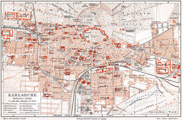 Ein detaillierter Stadtplan von Karlsruhe, Deutschland aus dem Jahr 1900, mit Text und umfassender Stadtübersicht.