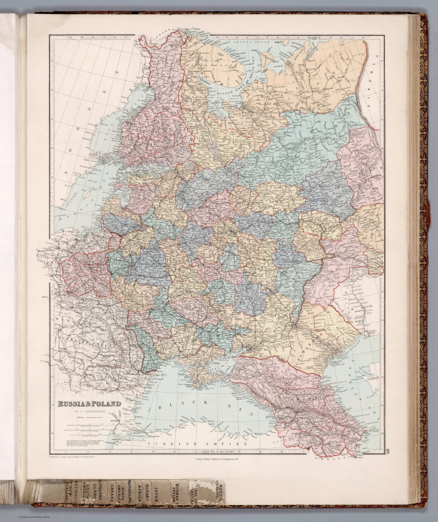 Offenes Buch mit detaillierter Karte von Deutschland und Polen mit Provinzgrenzen, Hauptstädten und geografischen Merkmalen sowie begleitendem Text.